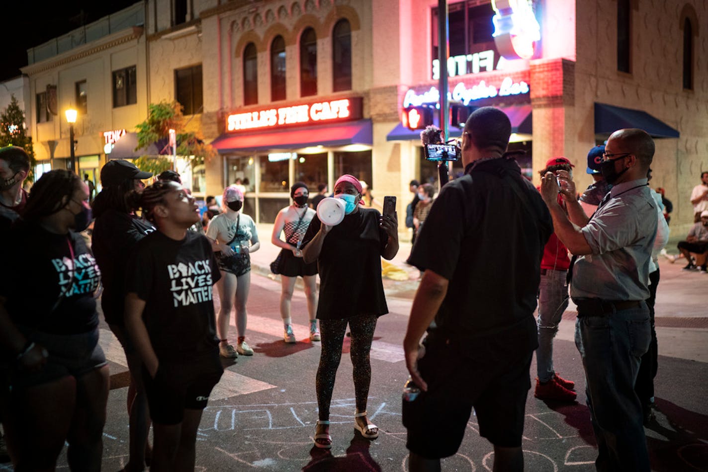 Protesters blocked off the intersection of Lake Street and Girard Avenue after a vigil for Winston Smith at a parking ramp in Uptown in Minneapolis, Minn., on Friday, June 4, 2021.