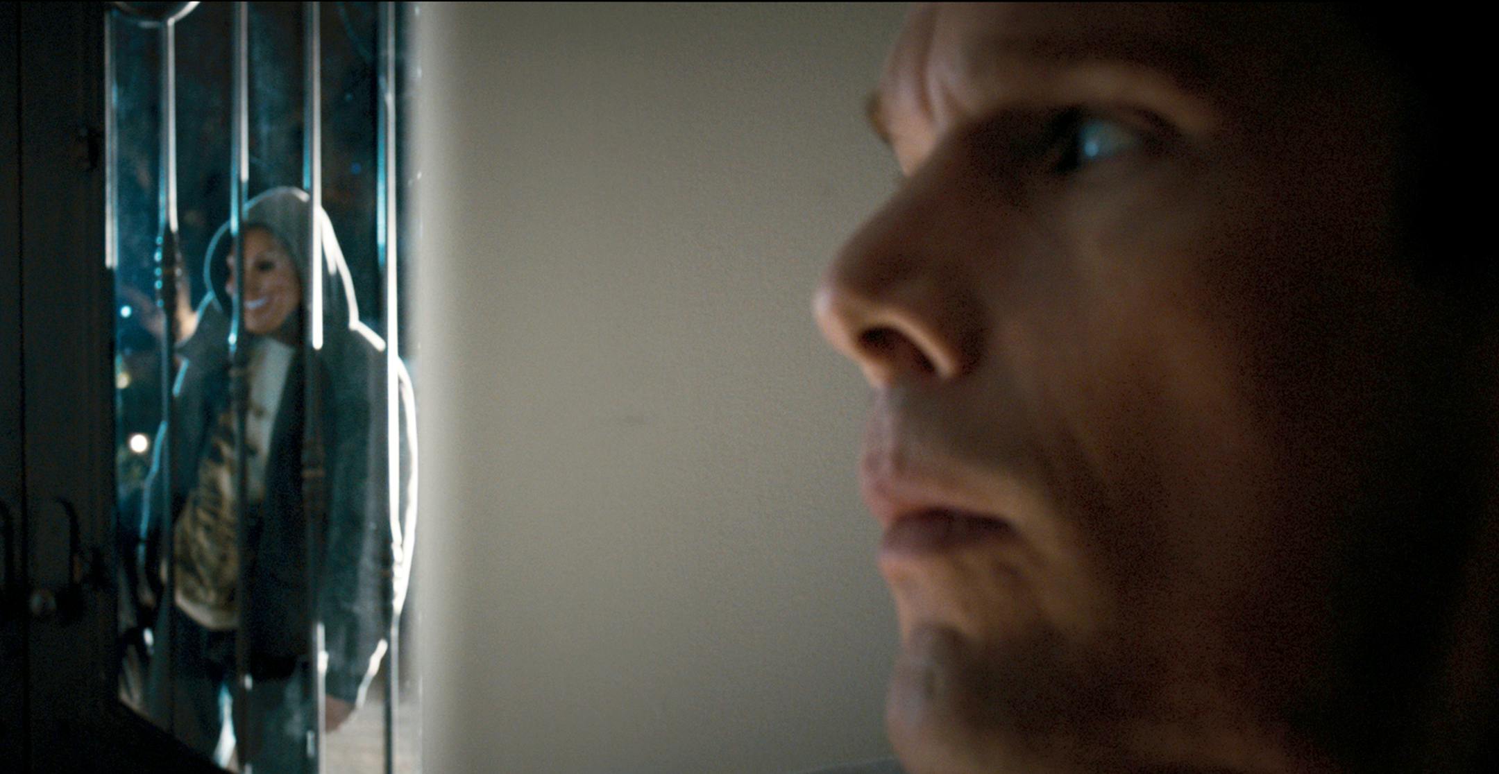 This film image released by Universal Pictures shows Ethan Hawke, right, in a scene from "The Purge." (AP Photo/Universal Pictures)