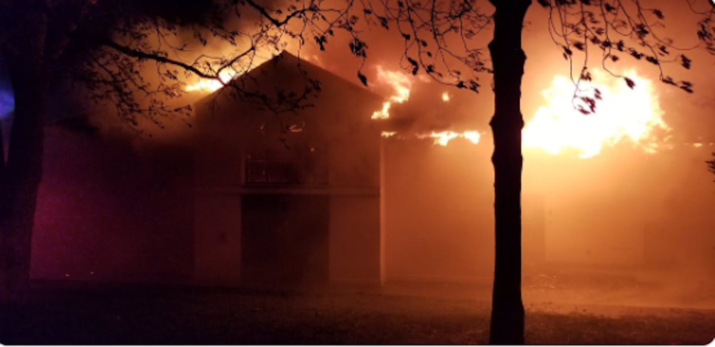 Flames were shooting into the air by the time firefighters arrived at the structure on the 3000 block of East Lake Calhoun Parkway.