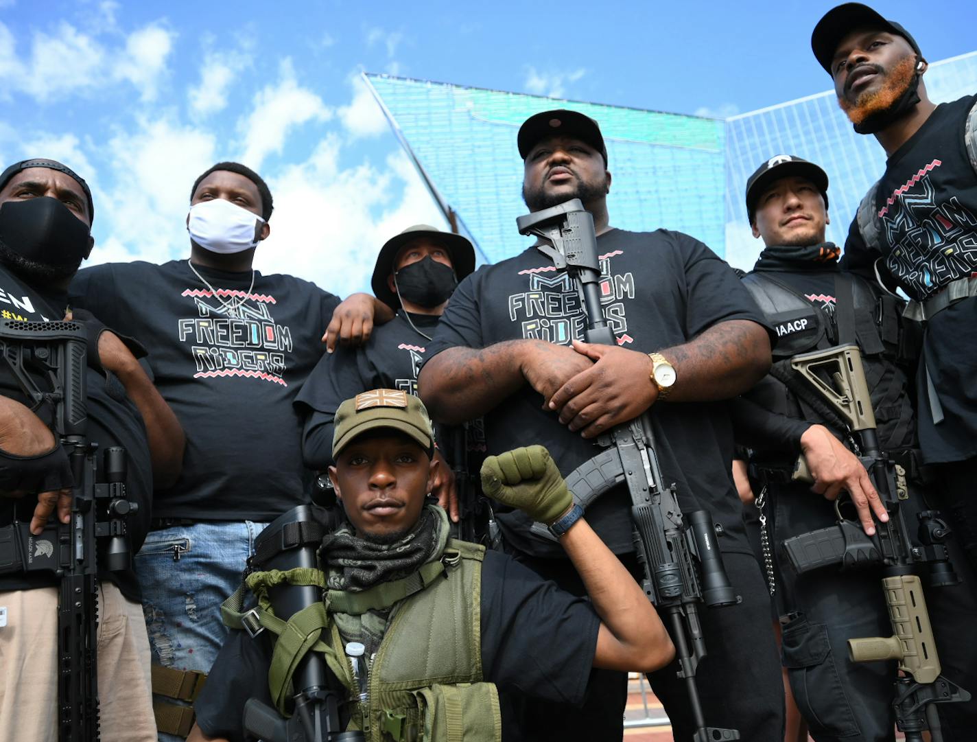 Members of the Minnesota Freedom Riders, some armed, posed for a photo during the 10K "Free North" event held Saturday, June 13, 2020 outside US Bank Stadium Saturday.] aaron.lavinsky@startribune.com ] 10K "Free North," march was held Saturday, June 13, 2020 outside US Bank Stadium in Minneapolis, Minn.