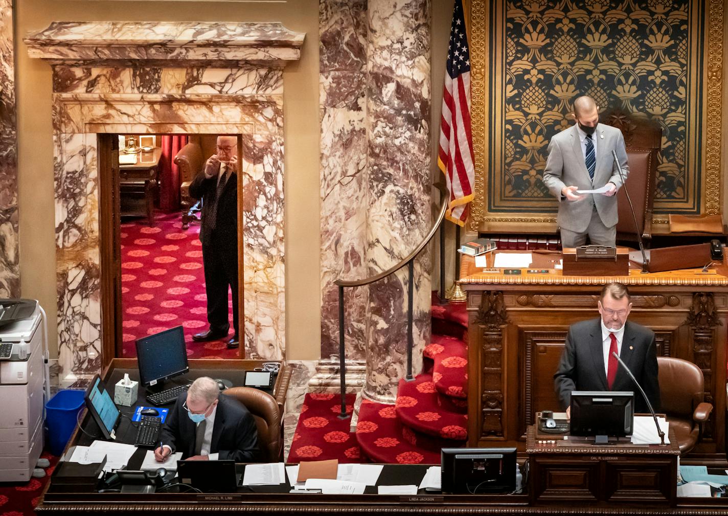 Sen. David Tomassoni of Chisholm waited in the retiring room while outgoing Senate President Jeremy Miller, R-Winona, conducted the vote that named him as his temporary successor, the first time a Senate president hasn't been from the majority party.