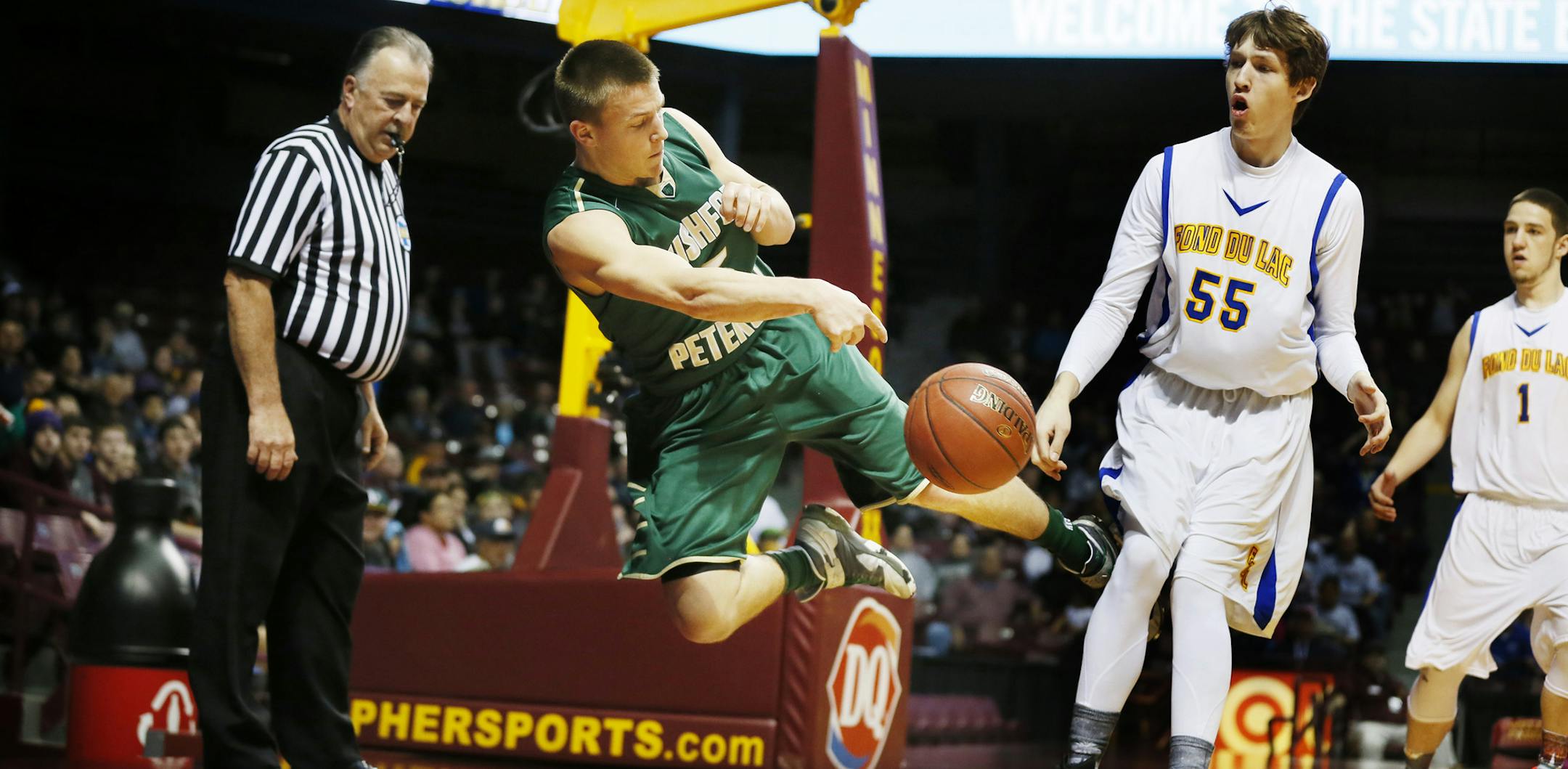 Alex Vix of Rushford-Peterson saved the ball from going out of bounds as Allen Trulson of Fon du Lac looked on in the first half. Fon du Lac Ojibwe played Rushford-Peterson in the 1A quarterfinals at Williams Arena Thursday March 12, 2015 in Minneapolis, Minnesota. ] Jerry Holt/ Jerry.Holt@Startribune.com