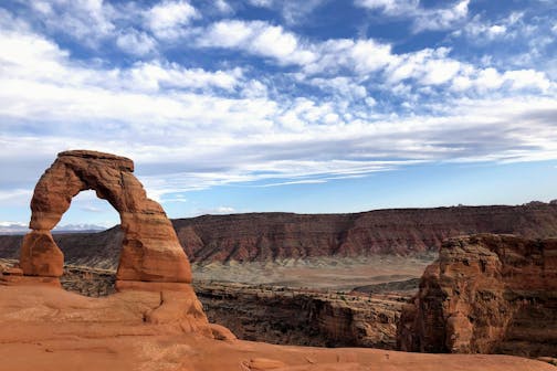 FILE - Delicate Arch is seen at Arches National Park on April 25, 2021, near Moab, Utah. As the world nears its third year of the COVID-19 pandemic, there is at least one industry that is bouncing back — Utah travel and tourism. (AP Photo/Lindsay Whitehurst, File)