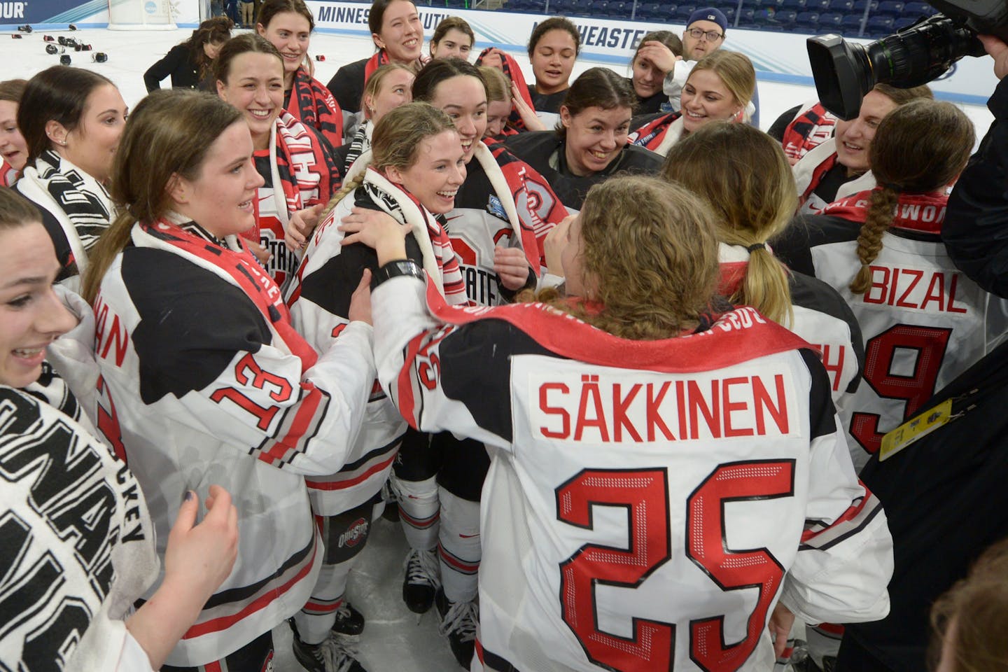 Ohio State's Paetyn Levis (27), center, who was named player of the tournament, celebrates with teammates after their win over Minnesota-Duluth to win the NCAA college Frozen Four Hockey championship Sunday, March 20, 2022, in State College, Pa. (AP Photo/Gary M. Baranec)