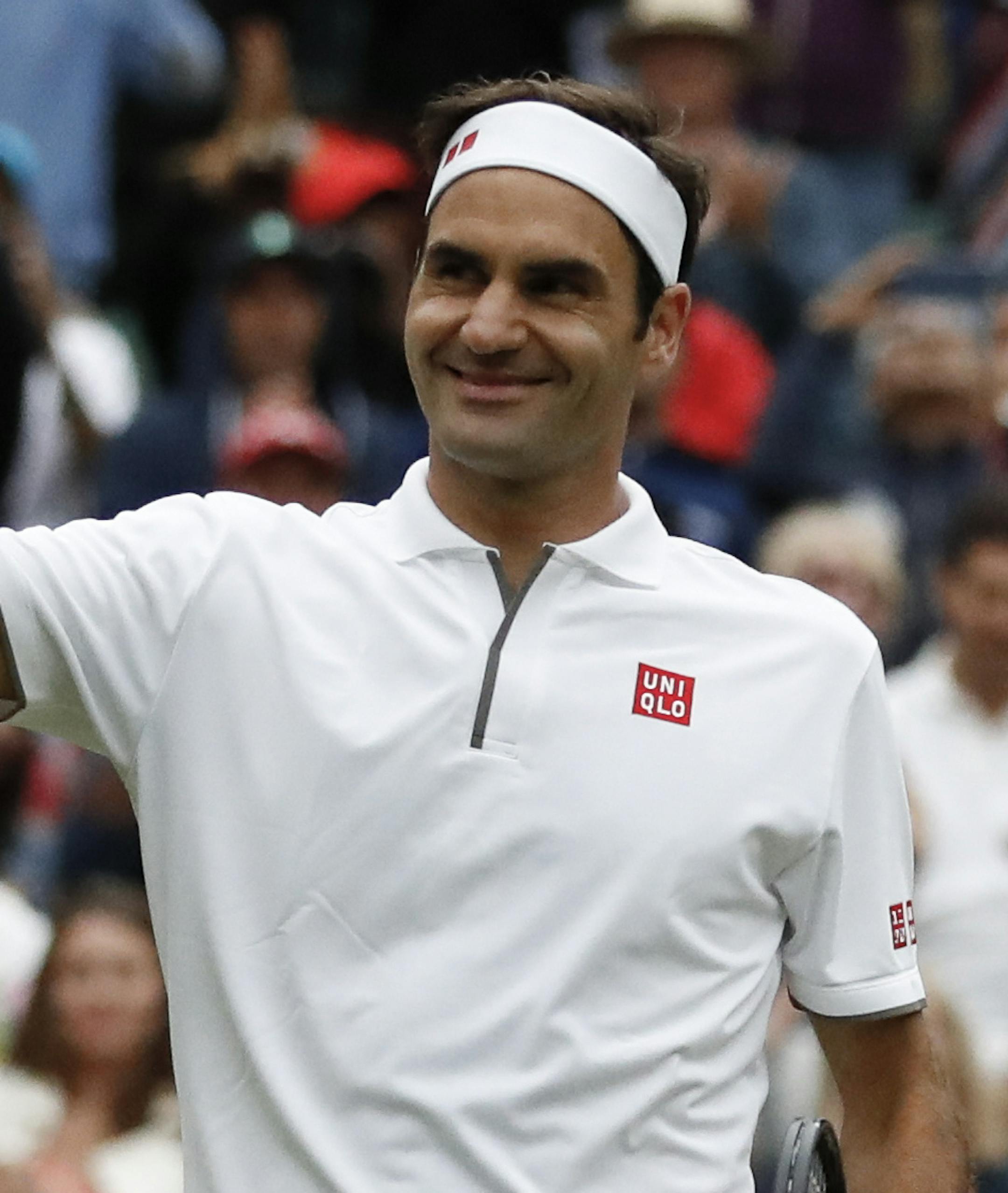 Switzerland's Roger Federer celebrates defeating Italy's Matteo Berrettini in a men's singles match during day seven of the Wimbledon Tennis Championships in London, Monday, July 8, 2019. (AP Photo/Alastair Grant)