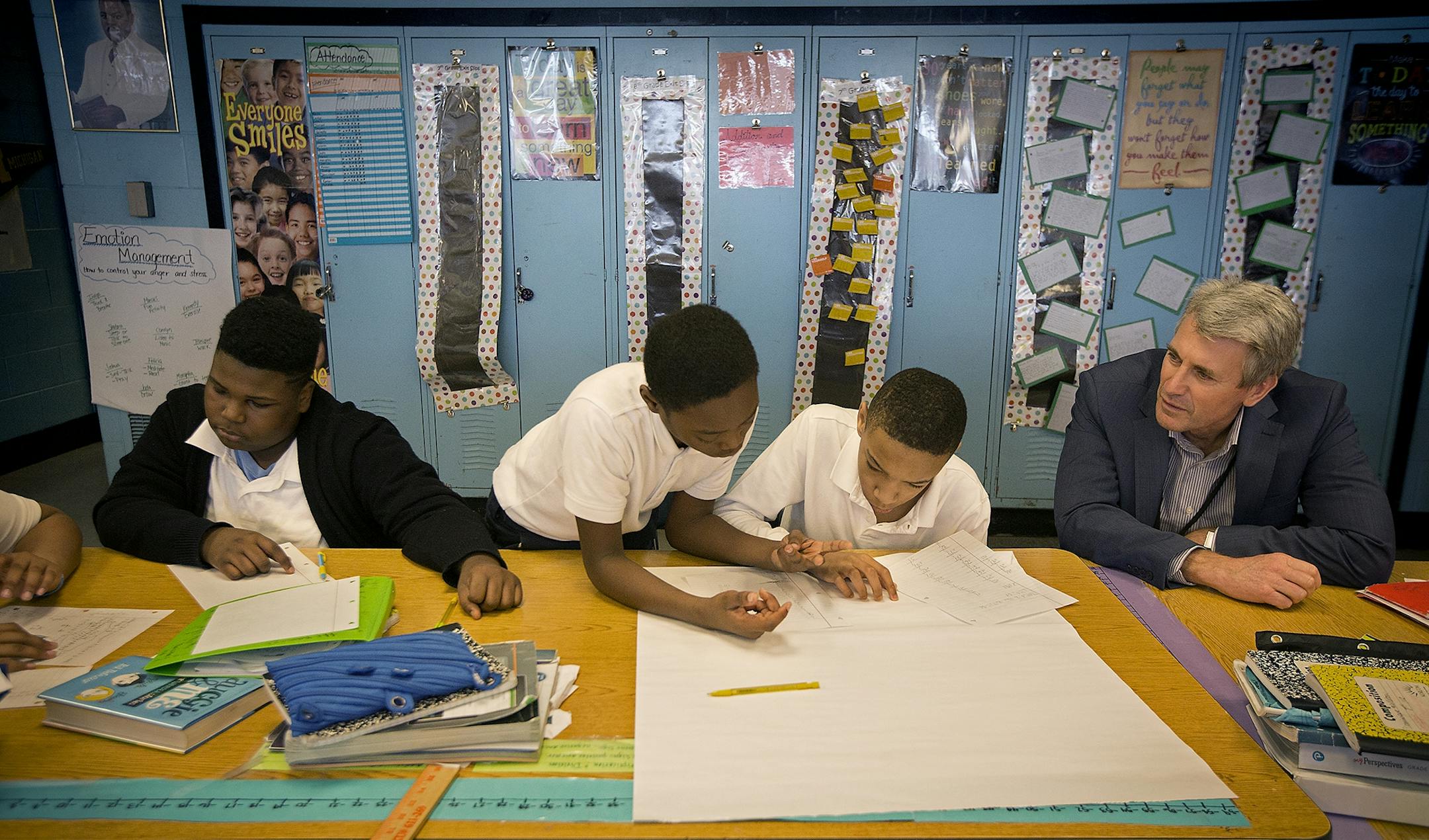 R.T. Rybak sat with students in a math class at Marcus Garvey Elementary School, Tuesday, March 21, 2017 in Chicago, IL. The Minneapolis school board, superintendent and district staff visited Chicago Public Schools to examine how the nation's third-largest school district is infusing social-emotional learning in its classrooms.