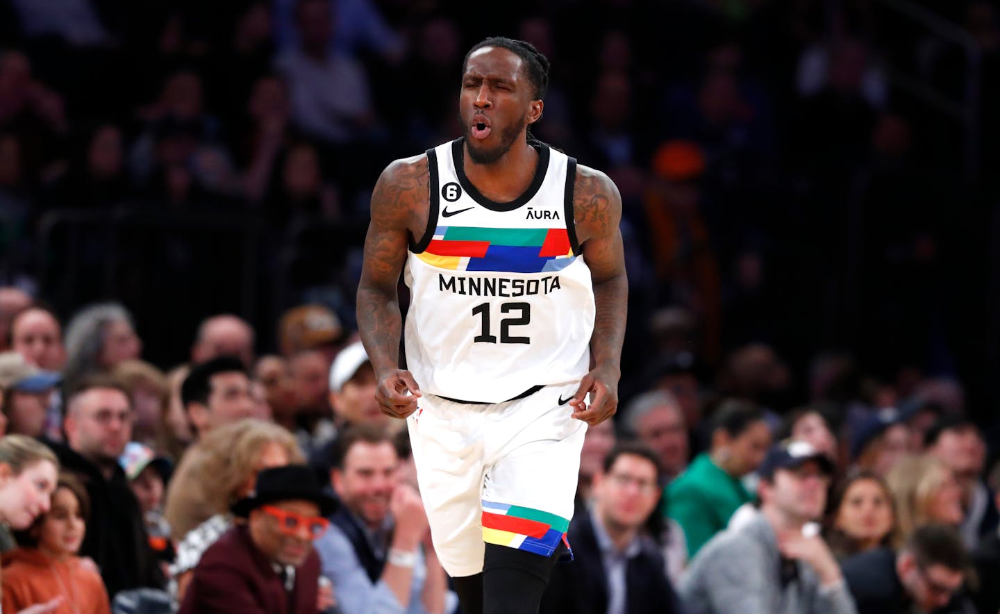 Minnesota Timberwolves forward Taurean Prince (12) reacts after making a 3-point basket against the New York Knicks during the second half of an NBA basketball game, Monday, March 20, 2023, in New York. (AP Photo/Noah K. Murray)