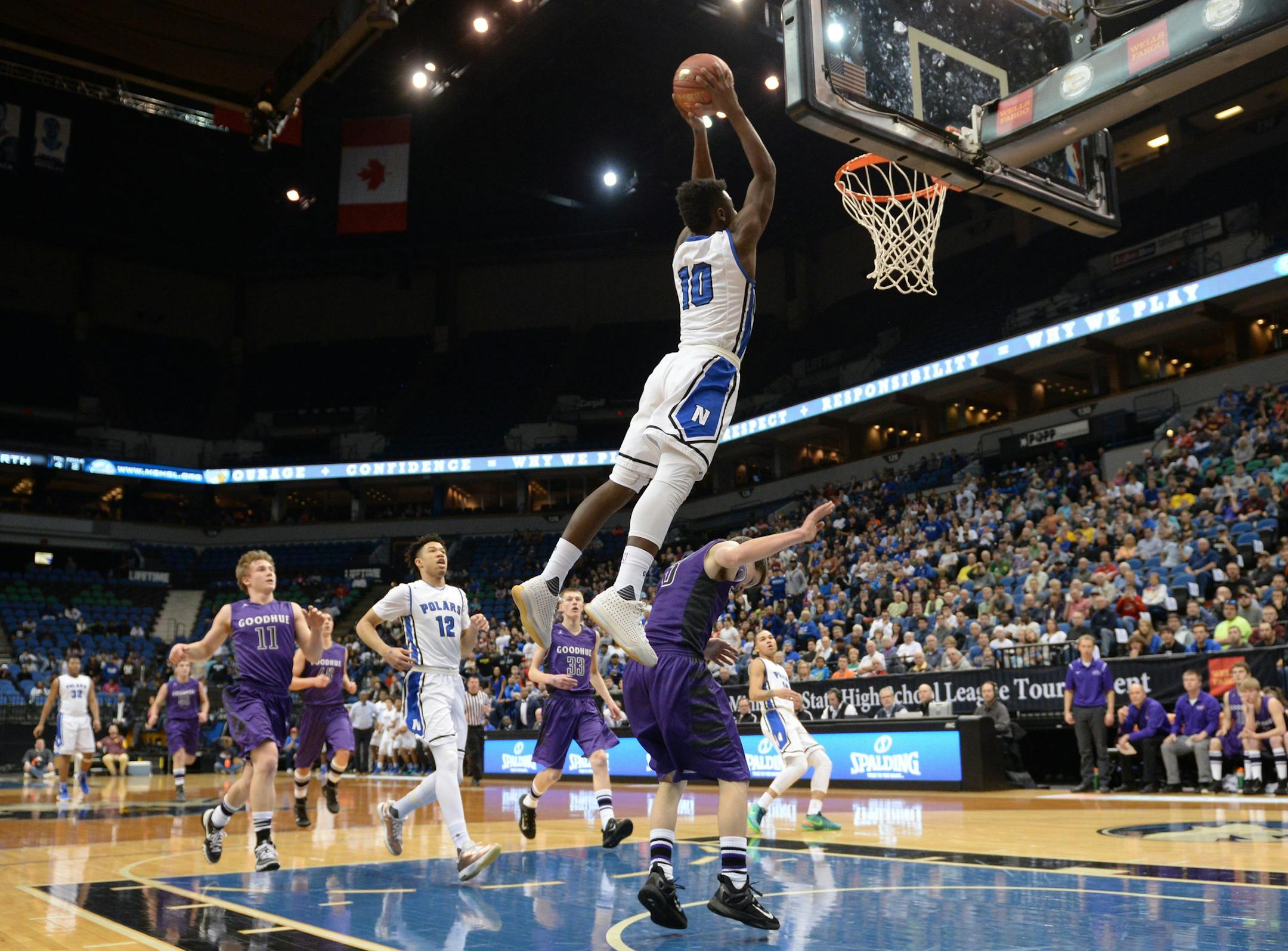 Minneapolis North guard Tyler Johnson (10) dunked the ball off an alley oop pass in the first half against Goodhue Saturday. ] (AARON LAVINSKY/STAR TRIBUNE) aaron.lavinsky@startribune.com Minneapolis North played Goodhue in the Class 1A boysÕ basketball championship game on Saturday, March 12, 2016 at Target Center in Minneapolis, Minn. ORG XMIT: MIN1603121202134065