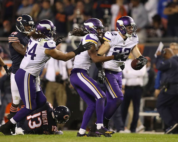 Minnesota Vikings free safety Harrison Smith (22) set up the winning touchdown after he intercepted a fourth quarter Bears' pass intended for tight en