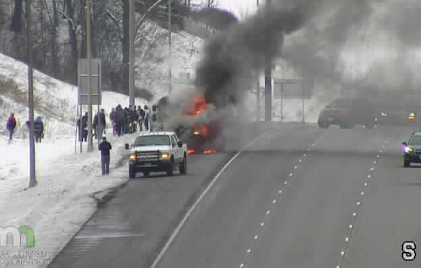 A school bus caught fire Monday in Woodbury. Credit: MnDOT traffic camera