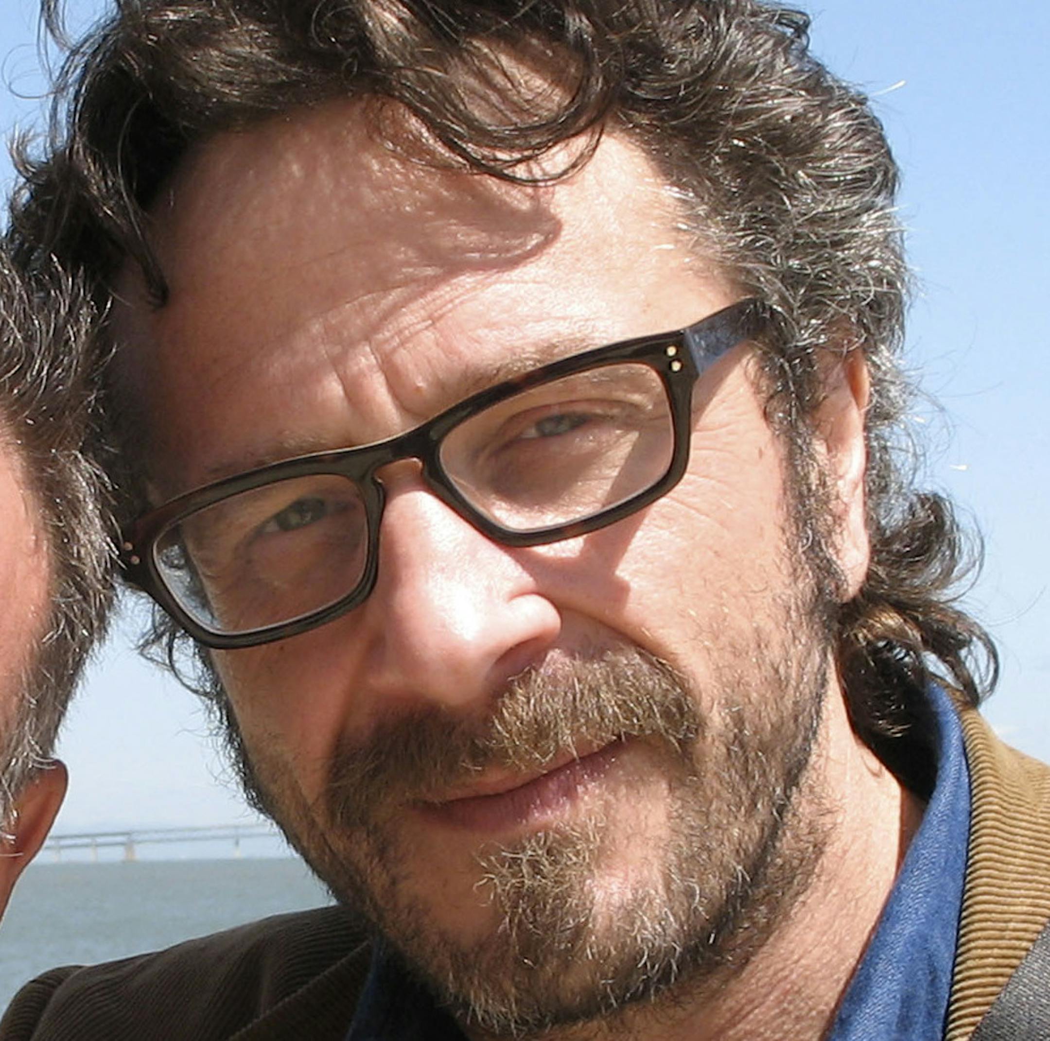 Marc Maron, right, with Robin Williams in an undated handout photo. Maron runs a cult-hit podcast, on which he gets other comedians to reveal surprising details from their lives. (The New York Times) -- MAGS OUT/NO SALES; FOR EDITORIAL USE ONLY WITH STORY SLUGGED COMICS PODCAST ADV09 BY DAN SALTZSTEIN. ALL OTHER USE PROHIBITED. -- PHOTO MOVED IN ADVANCE AND NOT FOR USE - ONLINE OR IN PRINT - BEFORE JAN. 9, 2011.