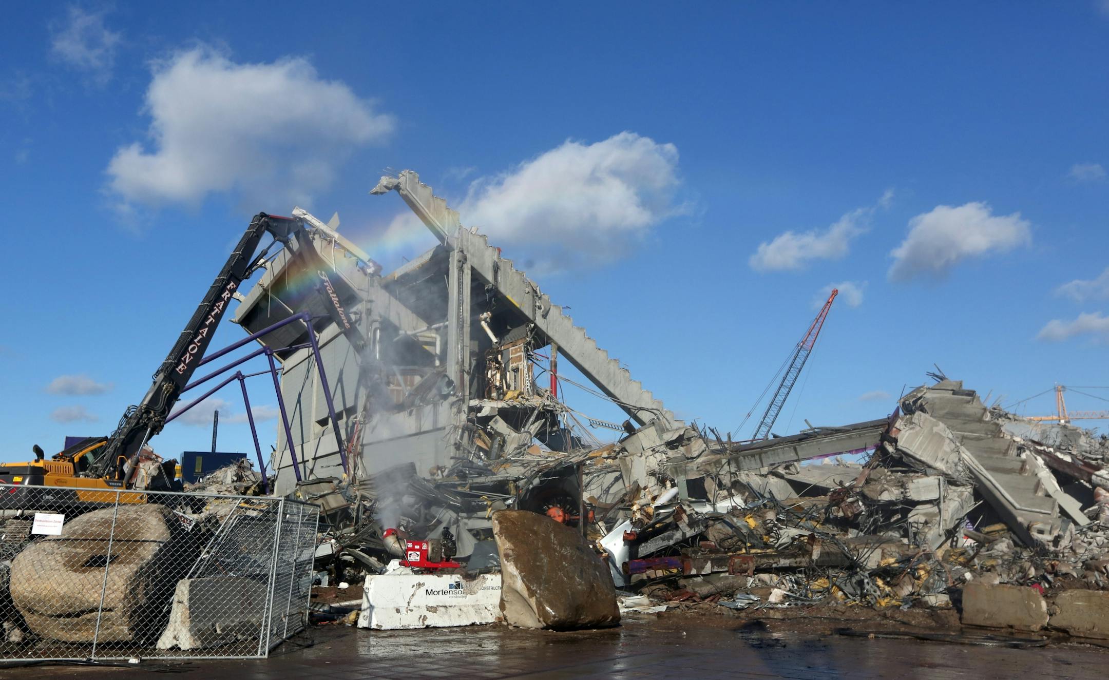 Workers tstarted tearing down the last standing bits of the Mall of America Field.