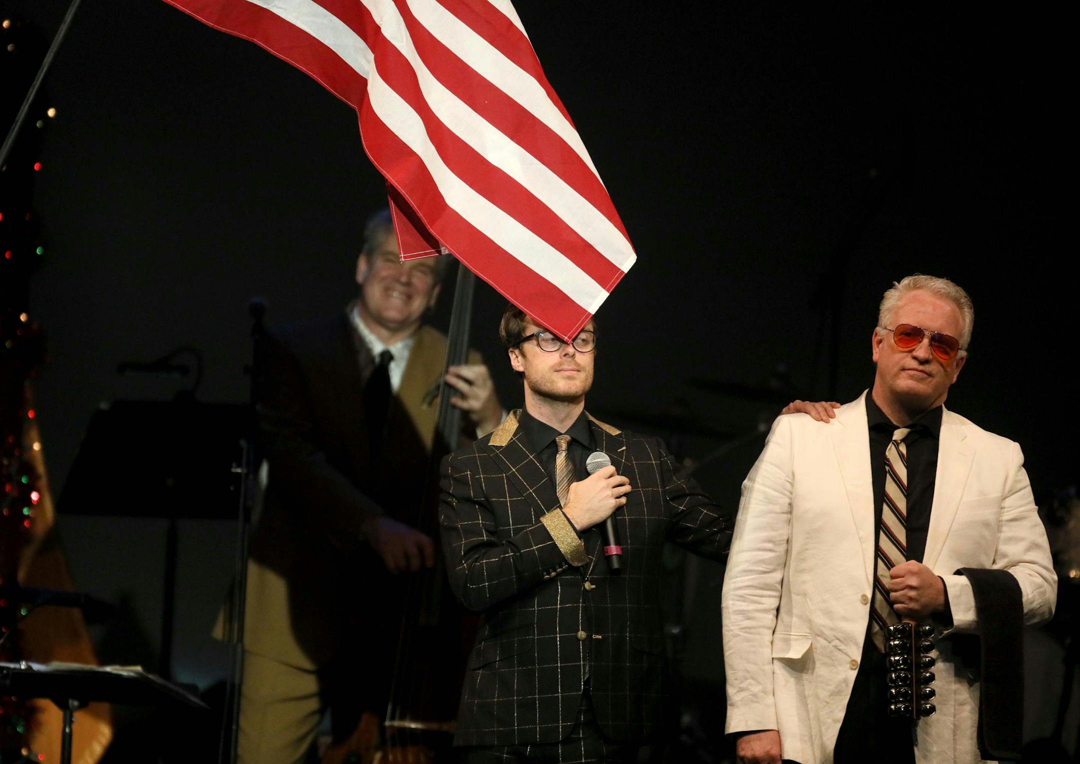 The New Standards holiday concert featuring Chan Poling, vocals John Munson, on bass and Steve Roehm on vibes and guest performer Jeremy Messersmith with mic at the State Theatre Friday, Dec. 7, 2018, in Minneapolis, MN. DAVID JOLES ï david.joles@startribune.com Review of the first of three holiday concerts by the New Standards at State Theatre