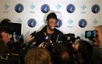 Andrew Wiggins, taking questions following Tuesday's news conference, is among a group of Wolves players already working out together at Target Center