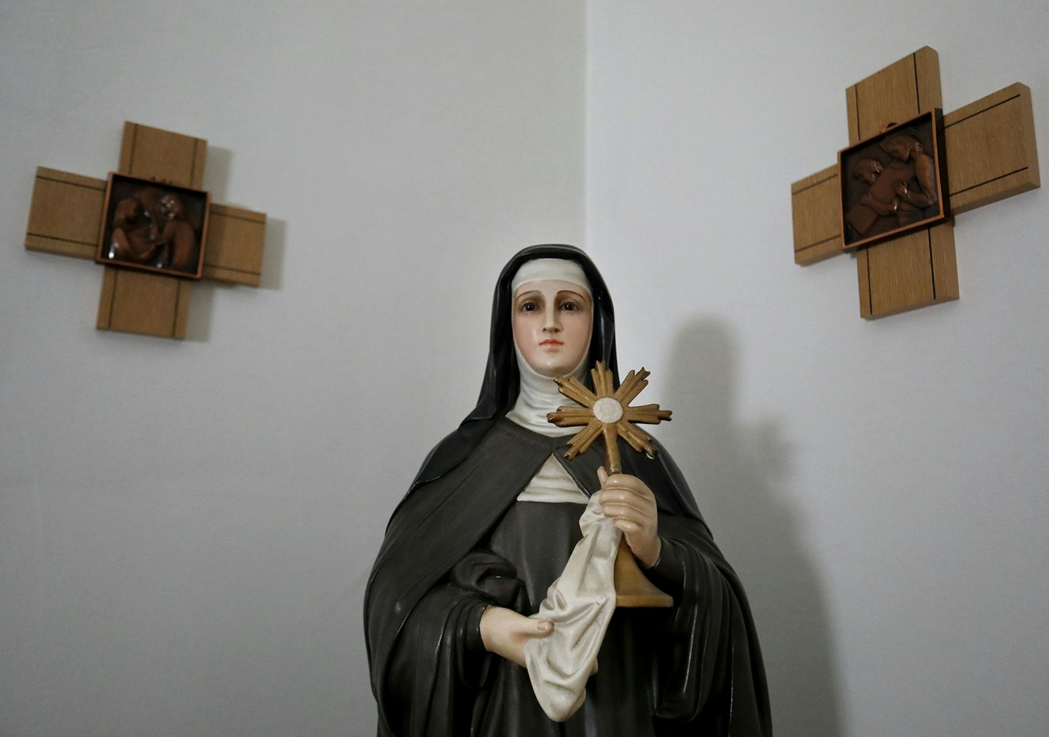 The likeness of Saint Clare of St. Clare's Monastery in the hallway outside of St. Clare's Monastery Chapel Thursday, April 16, 2020, in Sauk Rapids, MN. Poor Clare nuns of St. Clare's Monastery nuns met with journalists in the monastery's parlor, the one room where outsiders have partial access to the nuns in a room divided by a metal lattice with a folding wooden divider.