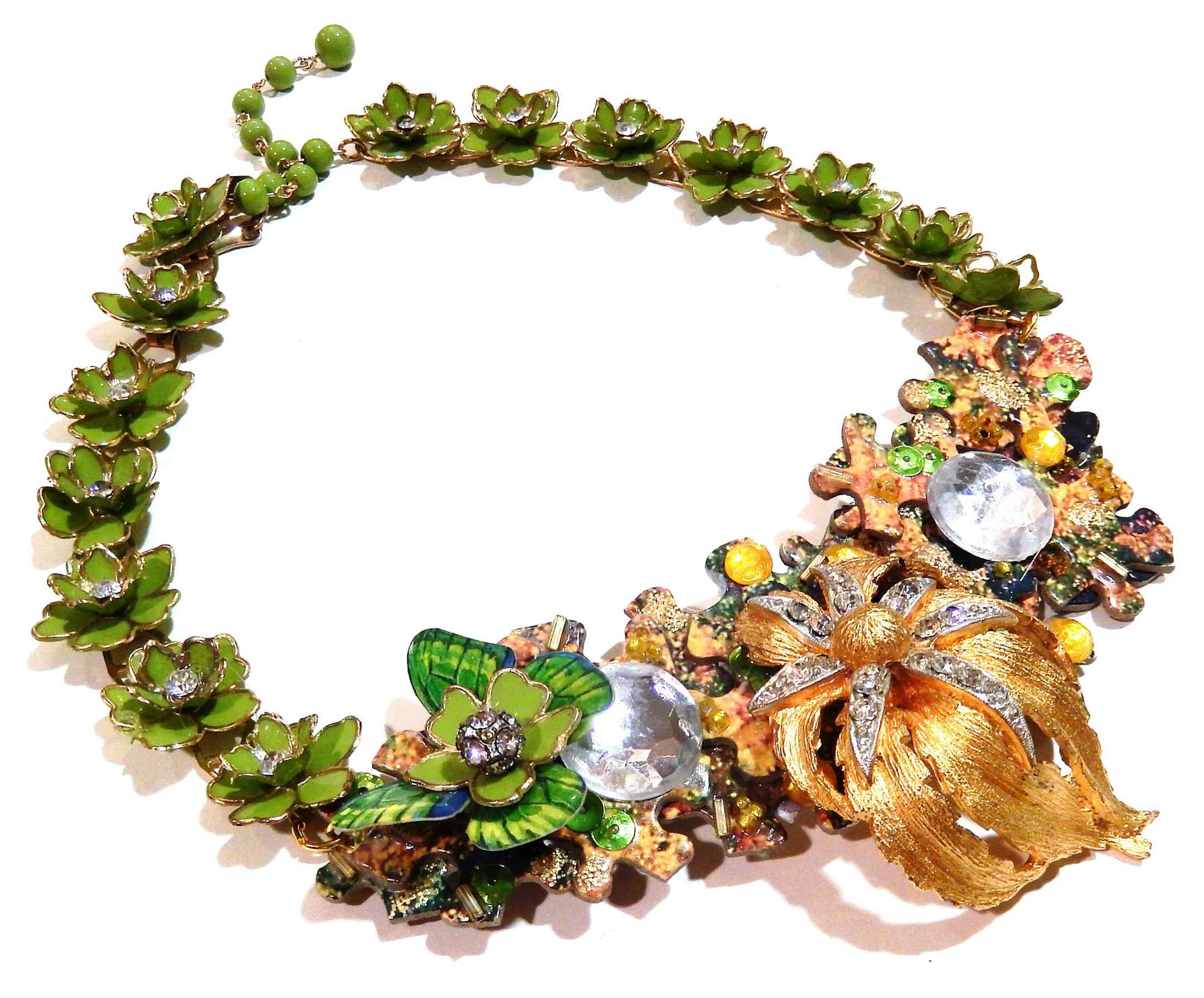 "Flowers & Puzzle Pieces" necklace with enamel butterfly by Stephanie Lake Design, $635 at www.stephanielakedesign.com.*