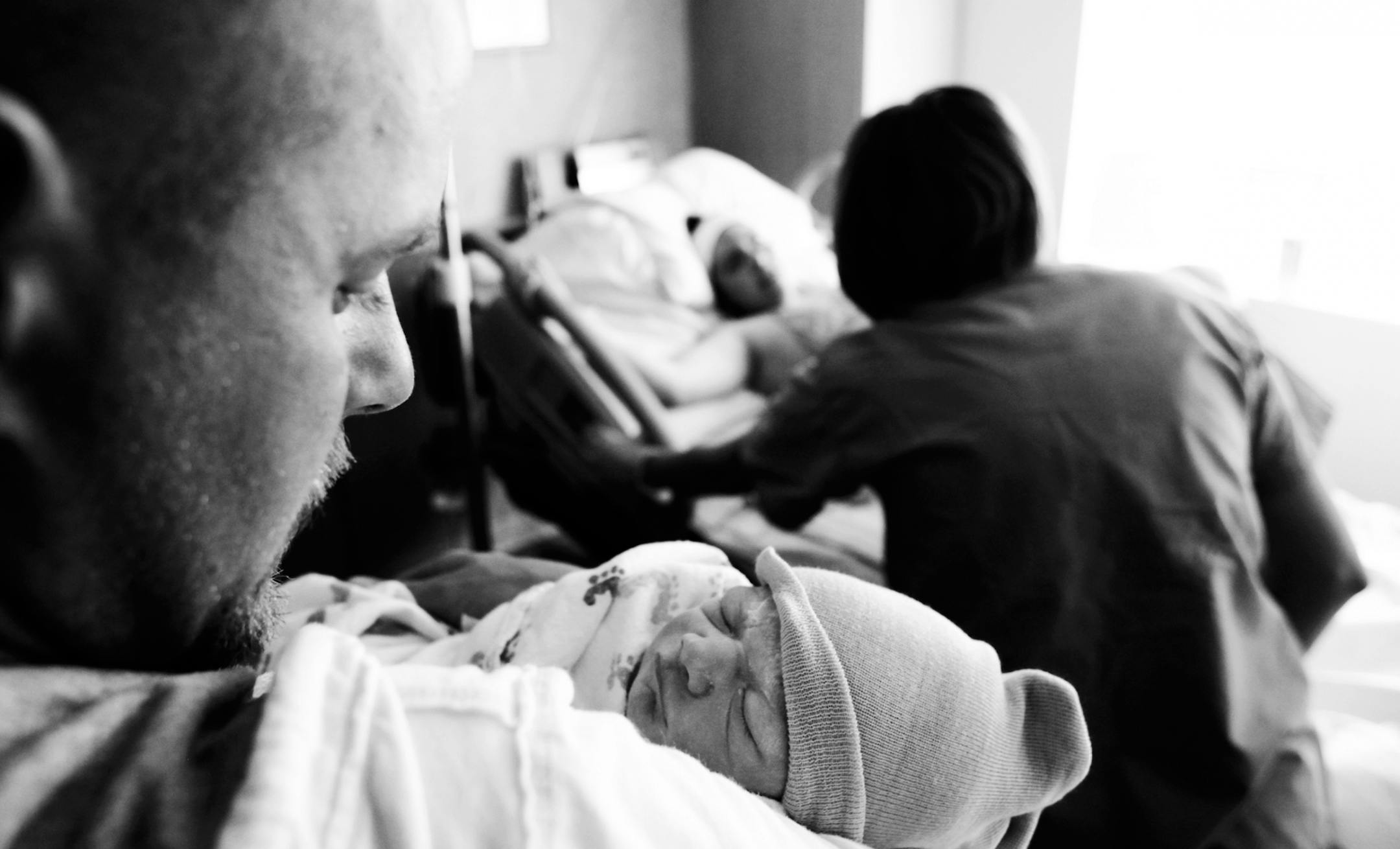 Dad Joe held Tyler for the first time and Sara was attended to after the birth.