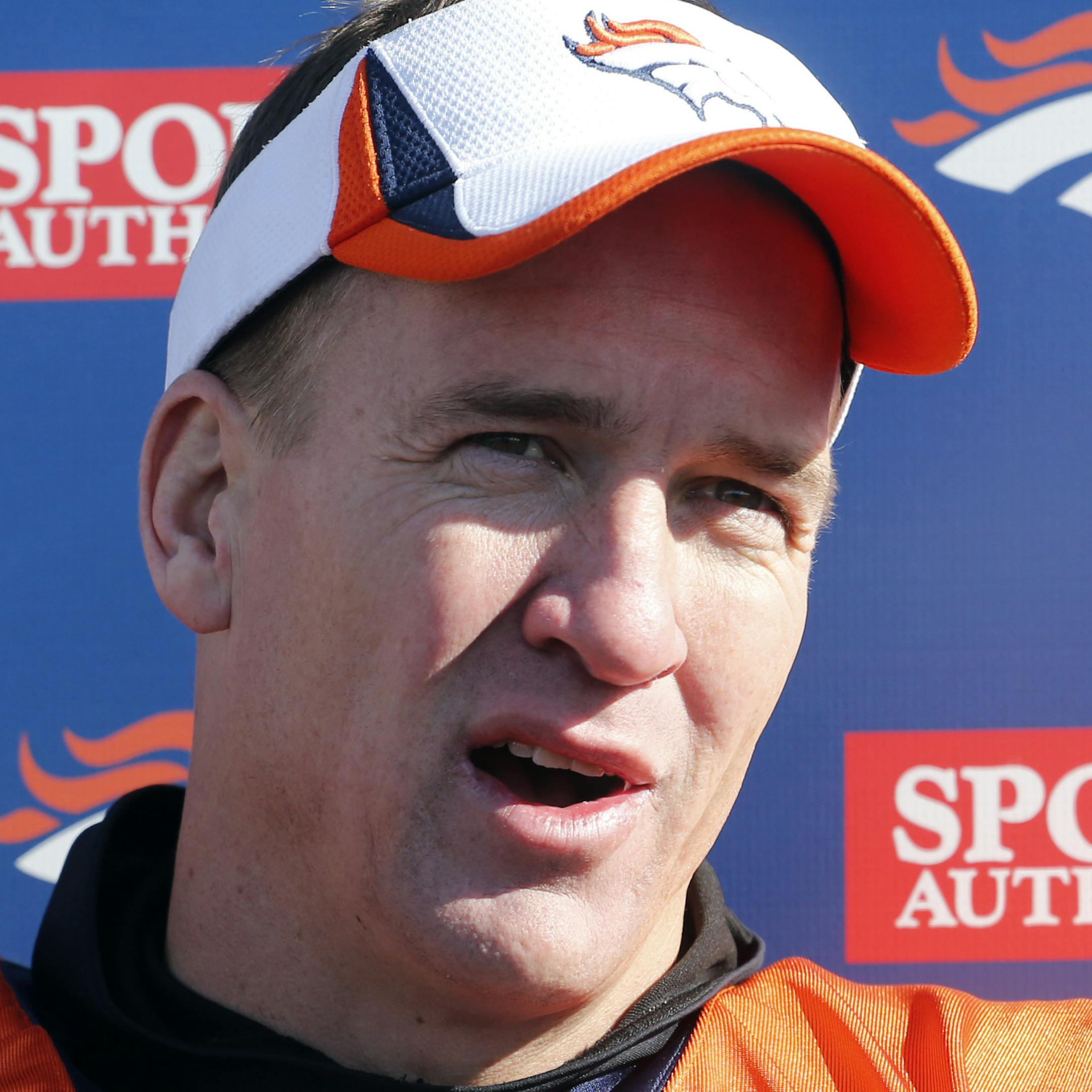 Denver Broncos quarterback Peyton Manning talks to the media after NFL football practice at the team's training facility in Englewood, Colo., on Thursday, Jan. 23, 2014. The Broncos are scheduled to play the Seattle Seahawks in Super Bowl XLVIII on Feb. 2. (AP Photo/Ed Andrieski)