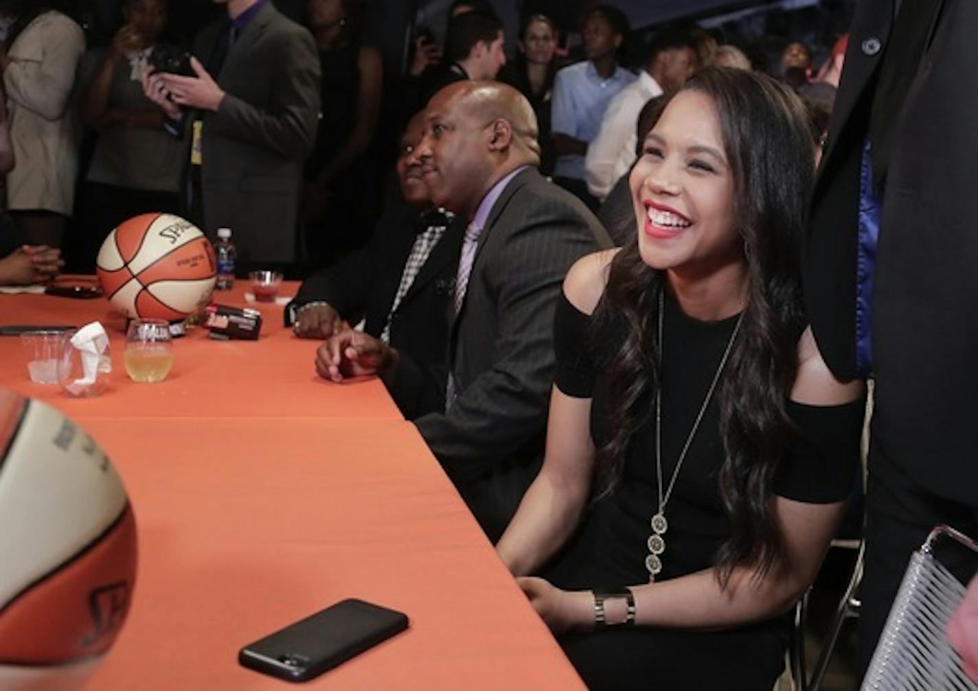 Northwestern's Nia Coffey reacts after being selected No. 5 in the WNBA draft on Thursday in New York.