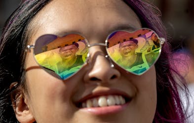 “I’m so exited,” said Hannah Fuchs as the Wolves’ Anthony Edwards is reflected on her shades at the Wolves Back Block Party in Minneapolis on 