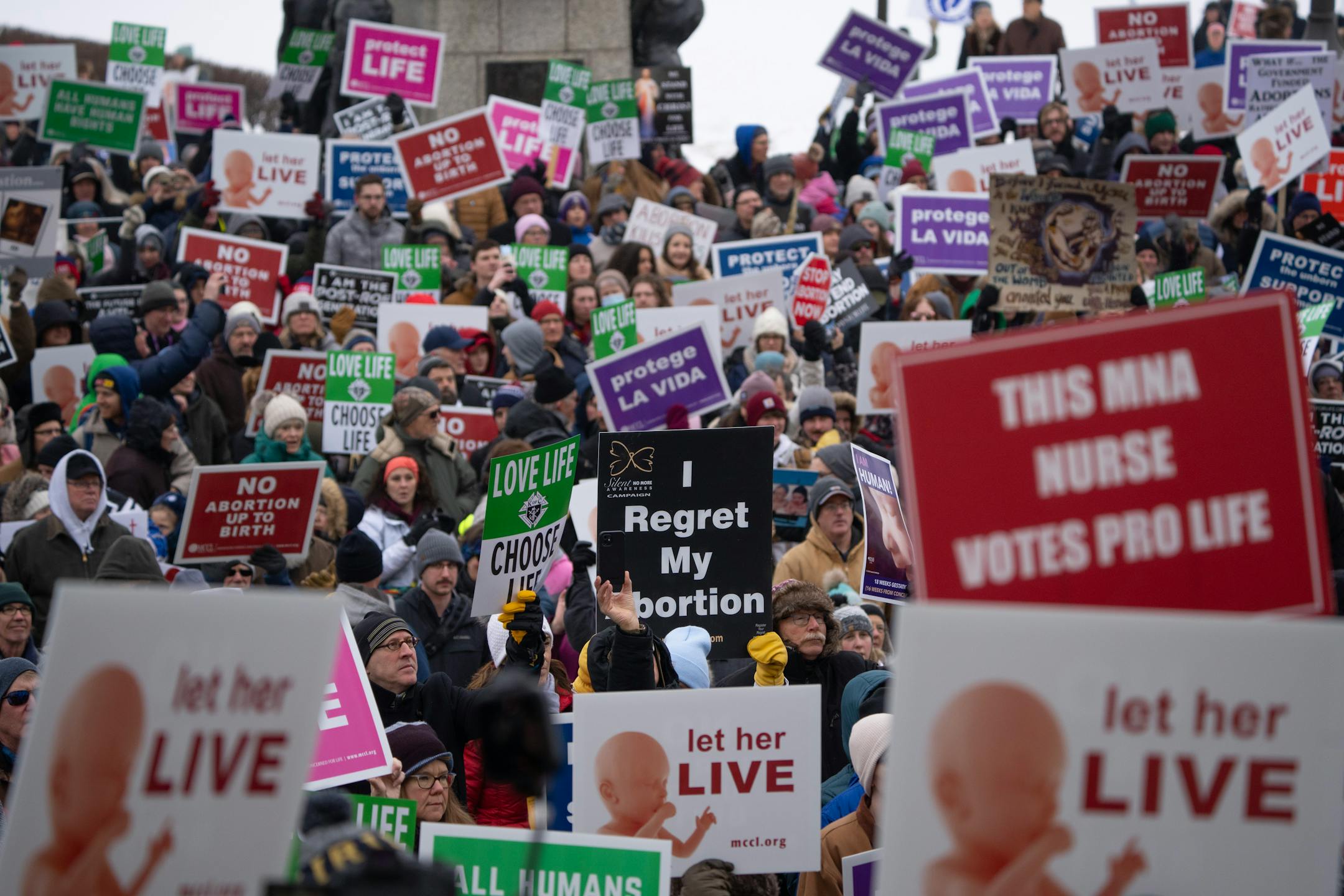 The assembled crowd held up their signs as they gathered for the March for Life rally.  Minnesota Citizens Concerned for Life hosted a 50th March for Life and the first since Roe was overturned at the State Capitol.