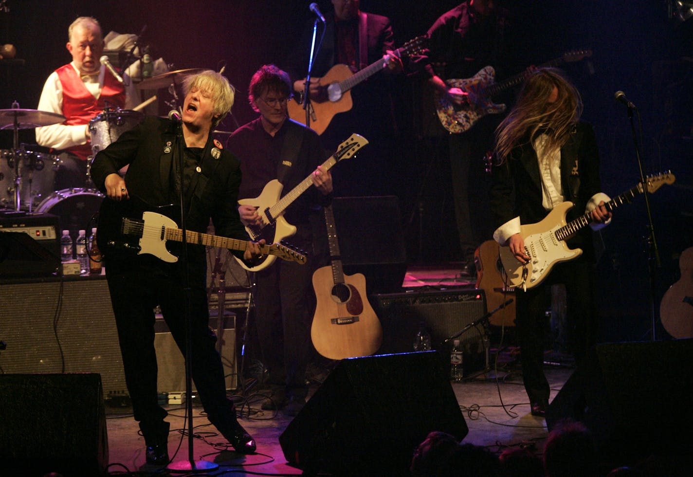 Curtiss A, at left, at one of his many John Lennon tributes.