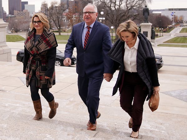 Lt. Gov.-elect Peggy Flanagan, Gov.-elect Tim Walz, and his wife, Gwen, arrived at the State Capitol.