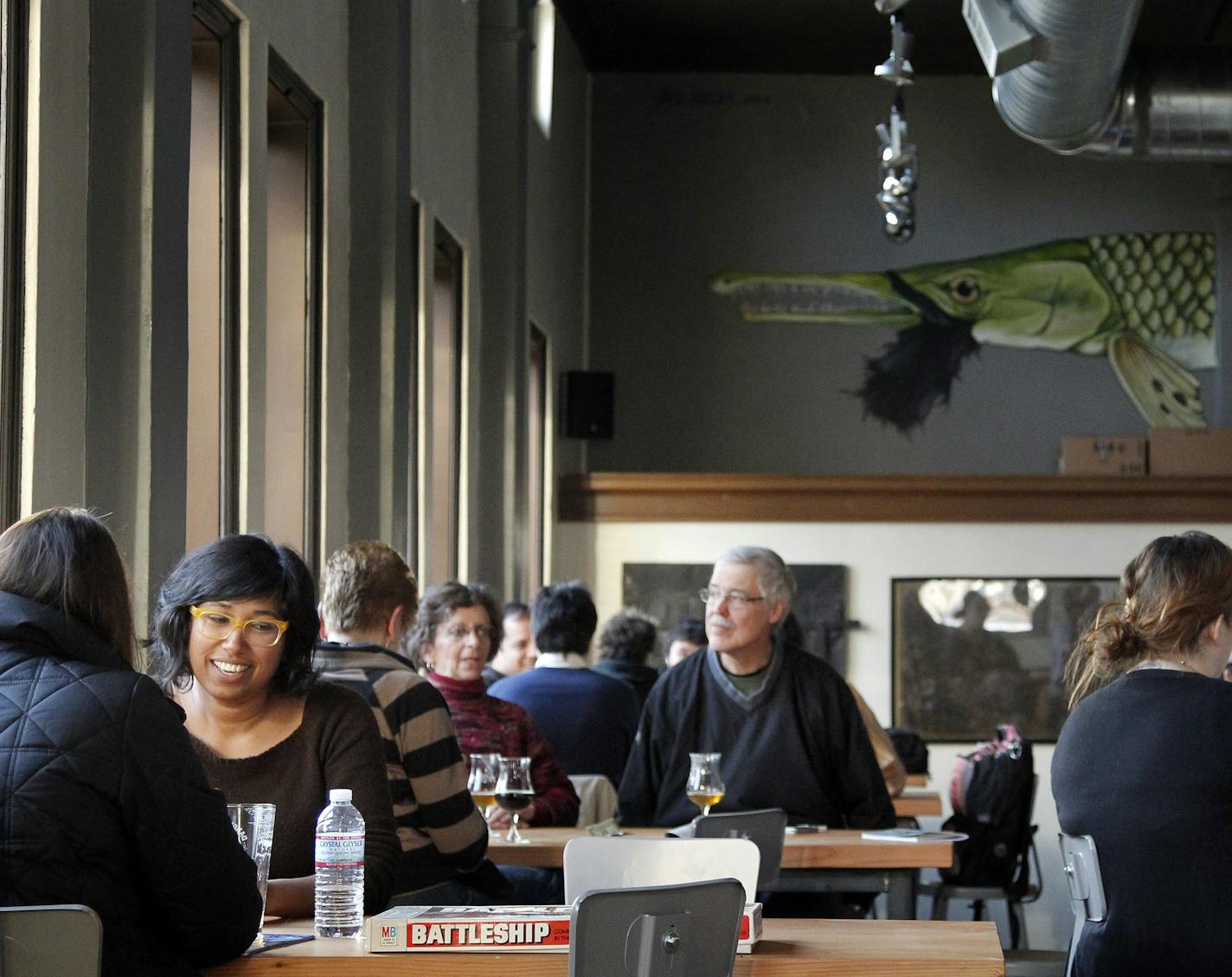 Patrons had beers at Dangerous Man Brewing Co. in Northeast Minneapolis. ] CARLOS GONZALEZ cgonzalez@startribune.com - March 14, 2013, Big Three northeast taprooms in Minneapolis, Indeed, 612 Brew, Dangerous Man