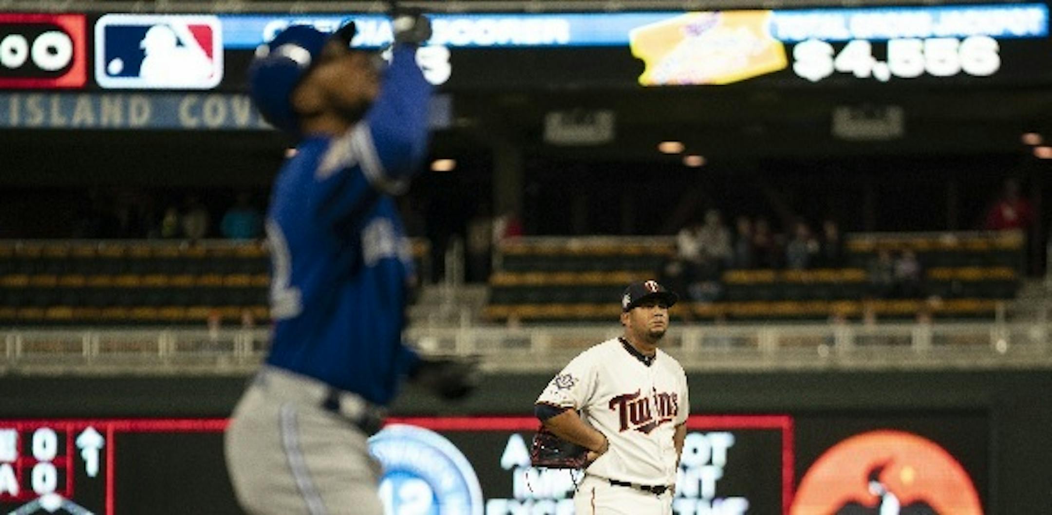 Twins reliever Adalberto Mejia watched as Blue Jays left fielder Teoscar Hernandez headed home after he connected for a three run homer in the eighth inning to go ahead 5-3.