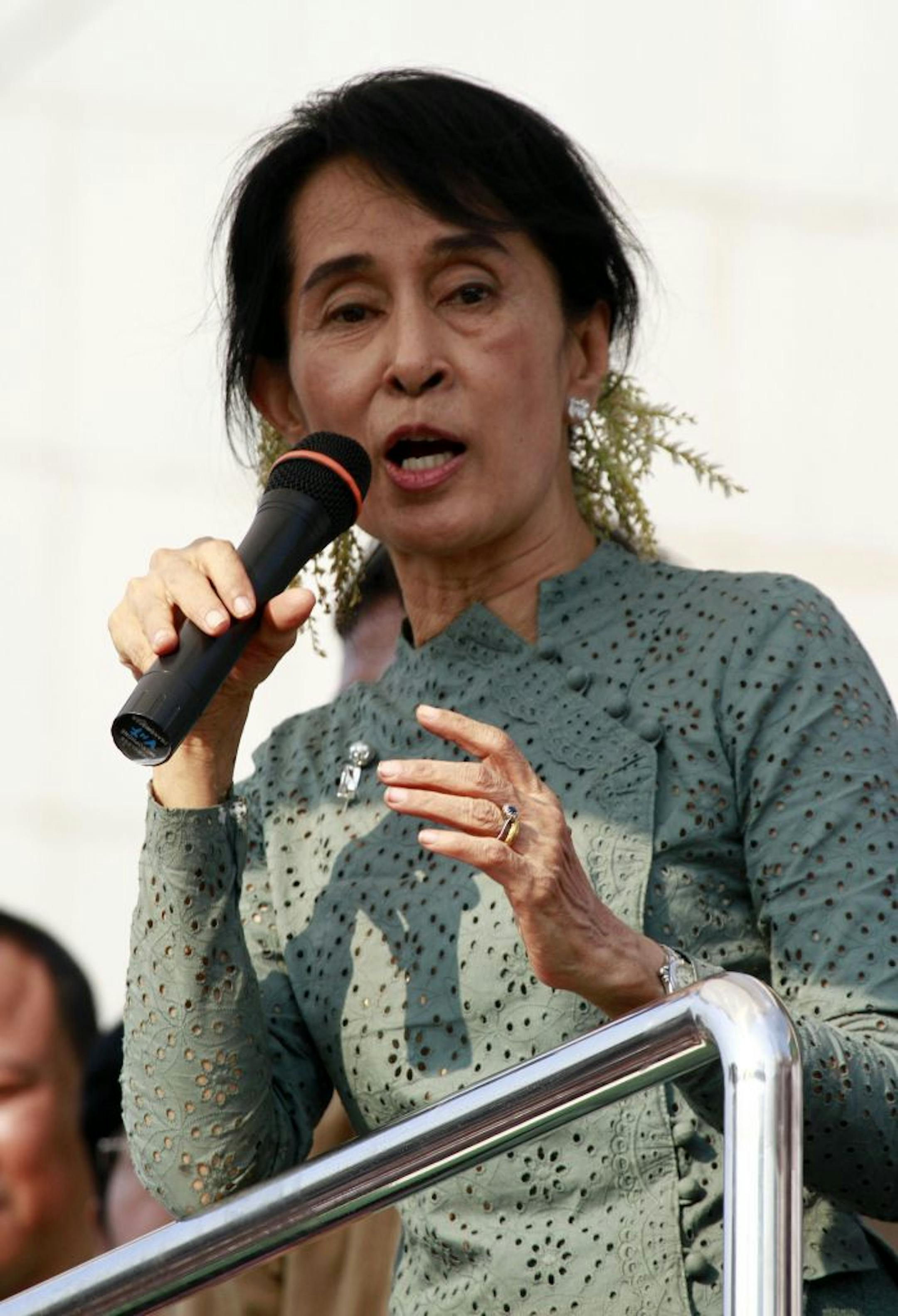 Pro-democracy leader Aung San Suu Kyi told supporters that "we have a lot to do."