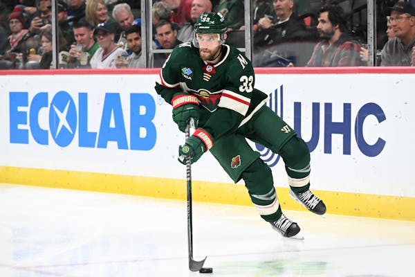 Minnesota Wild defenseman Alex Goligoski controls the puck against the New York Rangers during the second period Thursday, Oct. 13, 2022 at the Xcel E