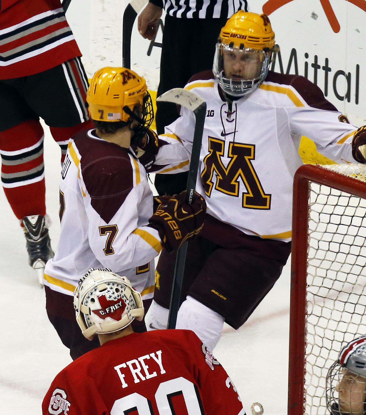 gophers Kyle Rau, left, and Travis Boyd celebrated after Rau beat Buckeyes goalie Christian Frey for a goal in 2nd period action. ] Big Ten Mens Hockey Tournament - Minnesota Gophers vs. Ohio State Buckeyes. (MARLIN LEVISON/STARTRIBUNE(mlevison@startribune.com)