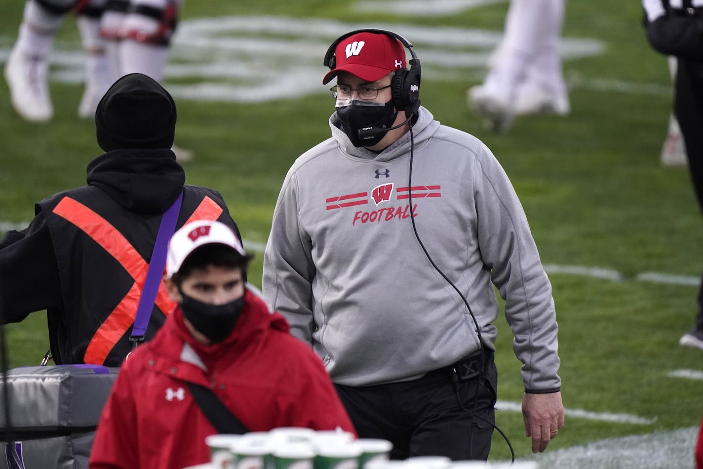 Wisconsin head coach Paul Chryst roams the sidelines during the first half of an NCAA college football game against Northwestern in Evanston, Ill., Saturday, Nov. 21, 2020. (AP Photo/Nam Y. Huh)