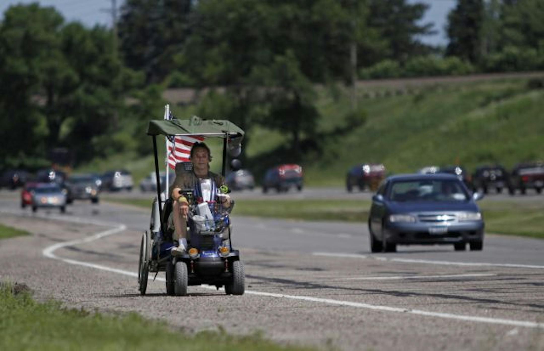 Robert Van Vranken was riding along Hwy. 10 in Anoka County as part of a planned 2,000-mile trip in his wheelchair to the Gulf of Mexico. The ride began on Memorial Day to raise awareness of the struggles disabled vets face.