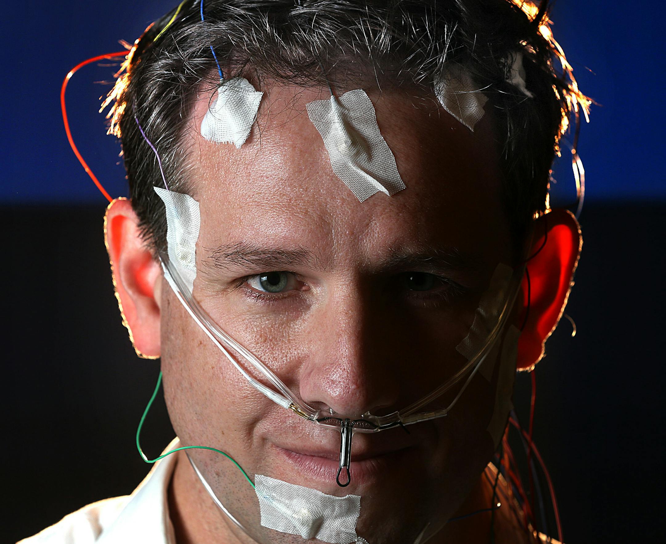 Sleep expert Dr. Michael Howell demonstrated how some apparatus is used for sleep studies at the University of Minnesota‚Äôs Sleep Medicine Clinic. ] JIM GEHRZ ‚Ä¢ jgehrz@startribune.com / Minneapolis, MN / August 29, 2014 / 10:00 AM / BACKGROUND INFORMATION: Sleep expert Dr. Michael Howell likes to walk on the wild side of sleep. A U of M physician and professor, he treats patients with extreme sleep disorders - those who walk, talk or act out in other ways whi