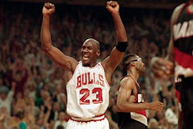 Michael Jordan celebrated a victory in the 1992 NBA playoffs. 