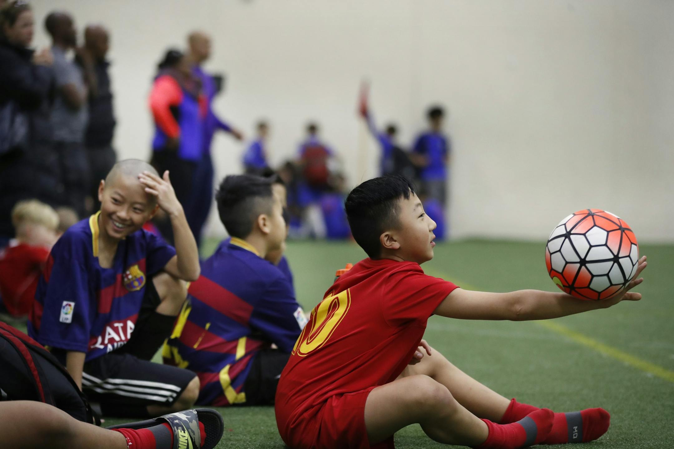 Muajnqis Ethan Xiong of the SPU Boys 13U/14U/ soccer team waited on the sidelines with others teams to play in the Four Score soccer tournament at the National Sports Center Sunday February 19, 2017 in Blaine, MN.