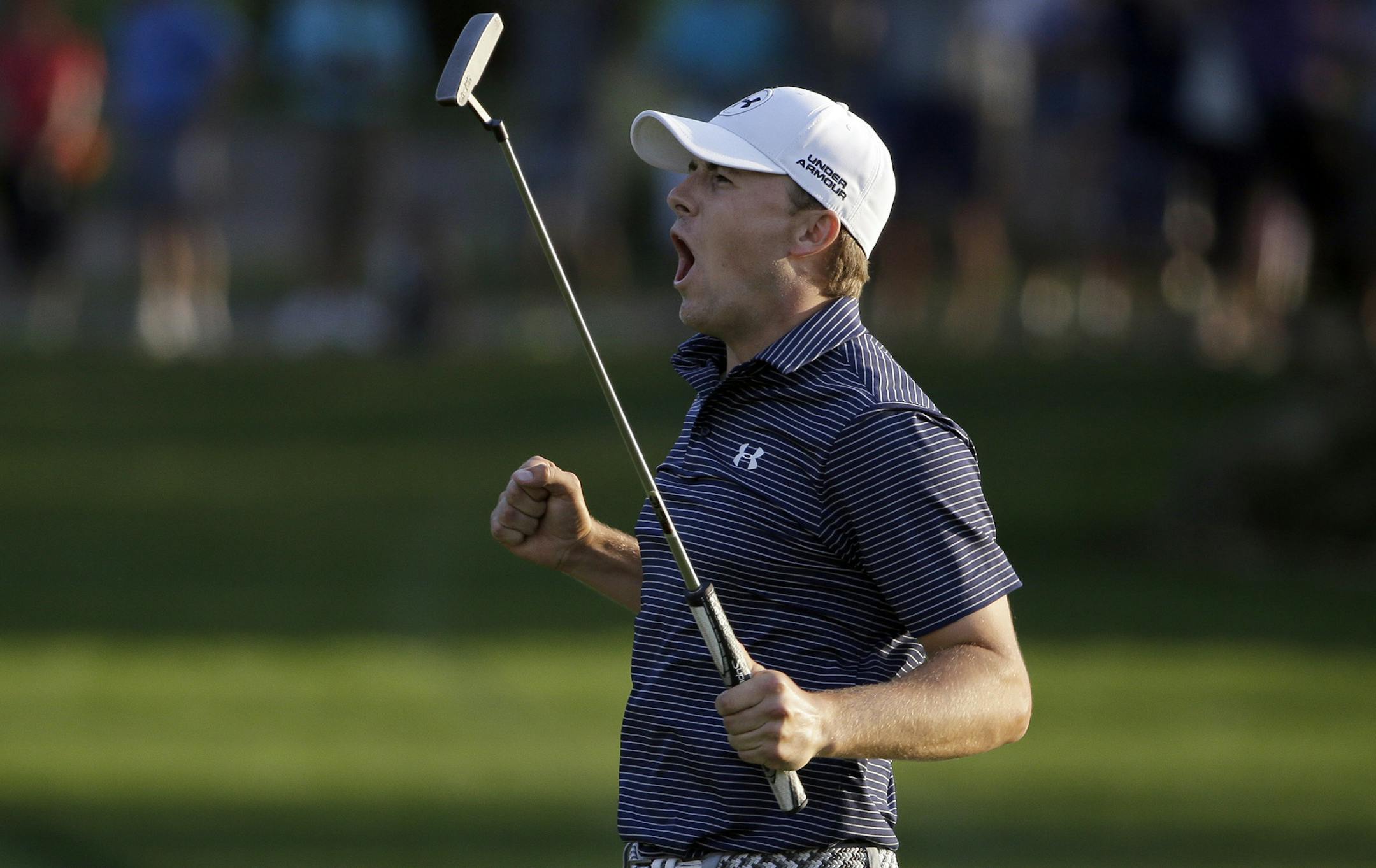 Jordan Spieth reacts after winning the Valspar Championship golf tournament on the third playoff hole Sunday, March 15, 2015, at Innisbrook in Palm Harbor, Fla. (AP Photo/Chris O'Meara)