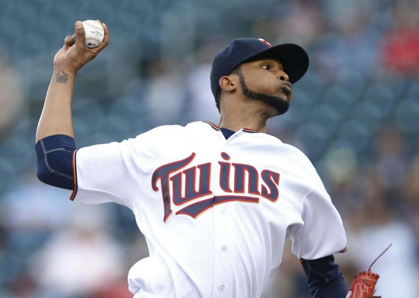 Minnesota Twins pitcher Ervin Santana throws against the Miami Marlins in the first inning of a baseball game Thursday, June 9, 2016, in Minneapolis.