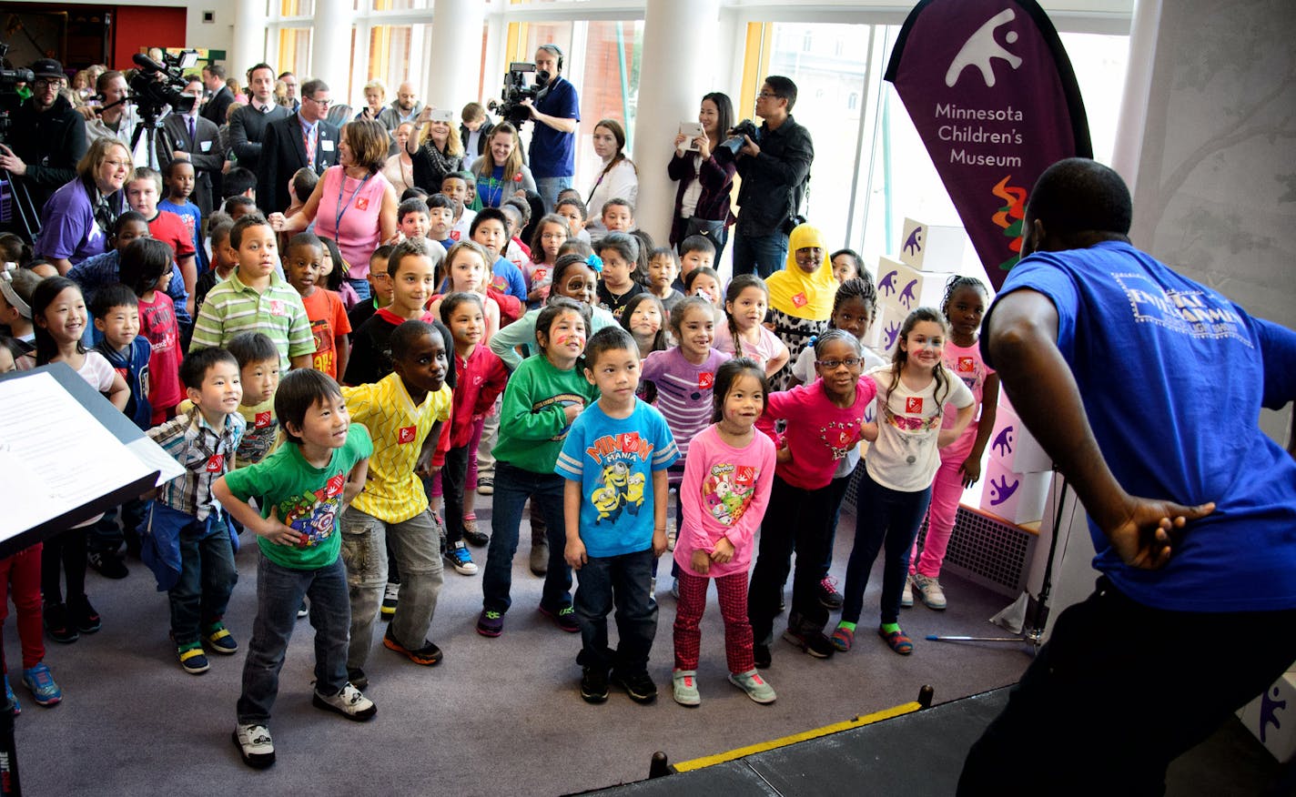 Kids danced as part of the #PlayMoreMN movement. ] GLEN STUBBE * gstubbe@startribune.com Wednesday, October 7, 2015 The Minnesota Children's Museum launched a major expansion Wednesday with a "Ground Shaking" instead of a ground breaking where kids symbolically built built a new museum with blocks emblazoned with the museum's new logo. Beach ball were also dropped from the top of the museum staircase. Governor Mark Dayton and Lt. Governor Tina Smith were also on hand and told of how their kids p