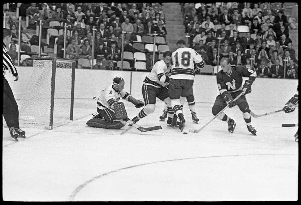 October 21, 1967: Bill Goldsworthy attacks the Oakland Seals goal in the North Stars' home opener