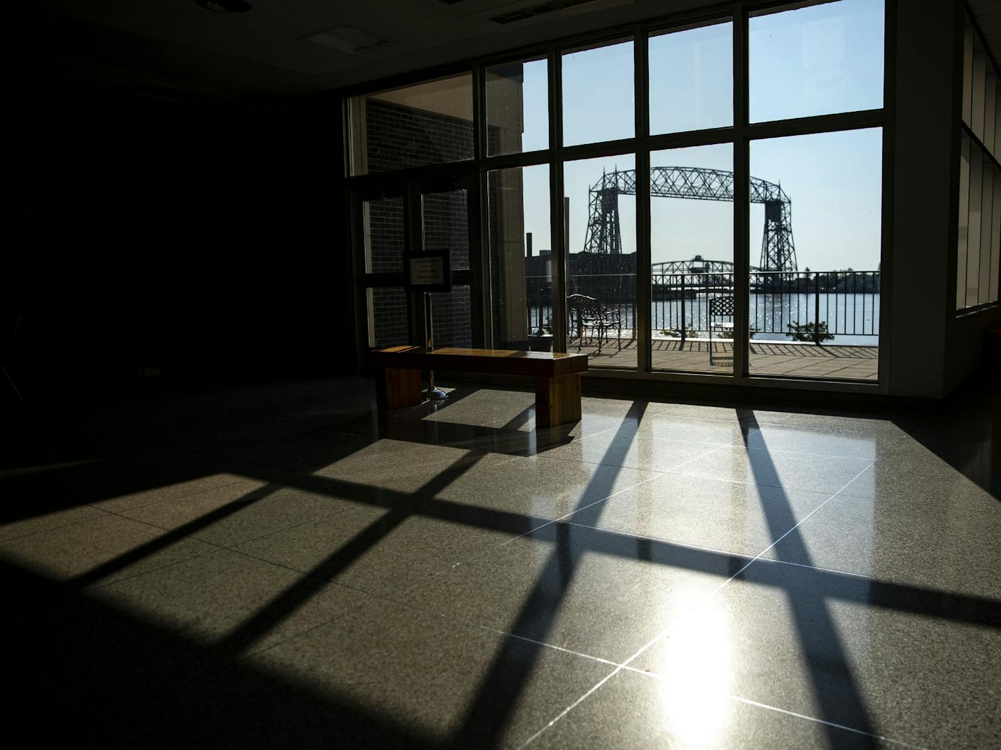 The aerial lift bridge could be seen out of a window in the DECC on Thursday morning. ] ALEX KORMANN • alex.kormann@startribune.com The DECC is a staple of Duluth's social sphere. It houses Amsoil Arena, home of the UMD men's and women's hockey teams as well as Symphony Hall and multiple convention spaces. The pandemic has taken it's financial toll on the DECC and left it virtually empty most days.