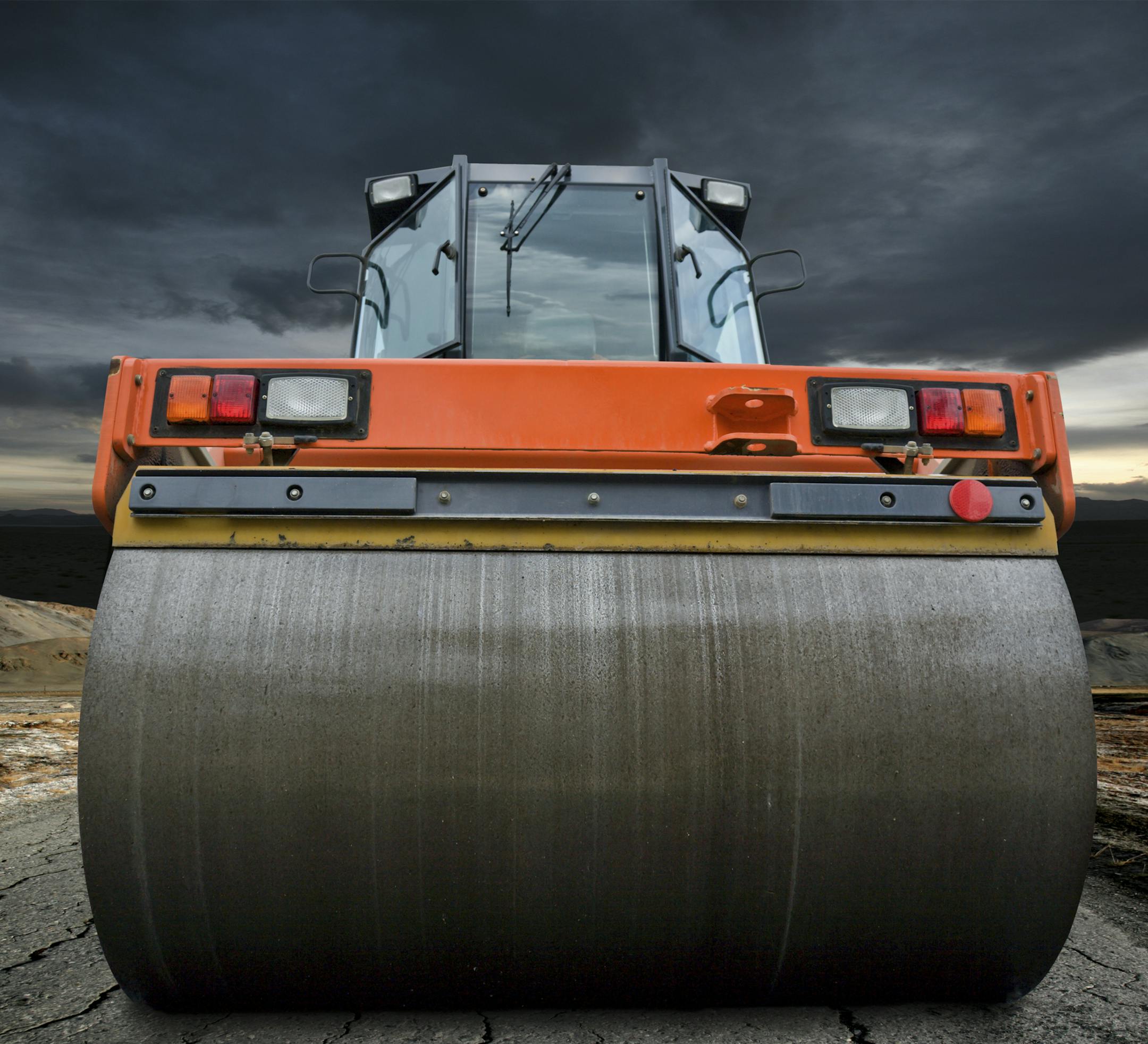 Road roller on the old highway untill a big strom approaching.