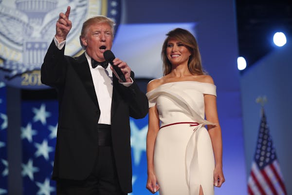 President Donald Trump and first lady Melania Trump arrive at the Freedom Ball in Washington, Jan. 20, 2017.