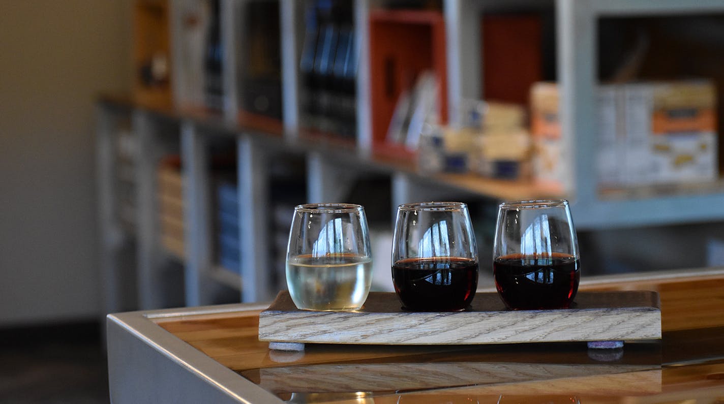 A $12 flight includes sauvignon blanc, meritage and cabernet franc in the hip, minimalist tasting room at Free Run Cellars in Berrien Springs, Michigan. (Lori Rackl/Chicago Tribune/TNS) ORG XMIT: 1335040