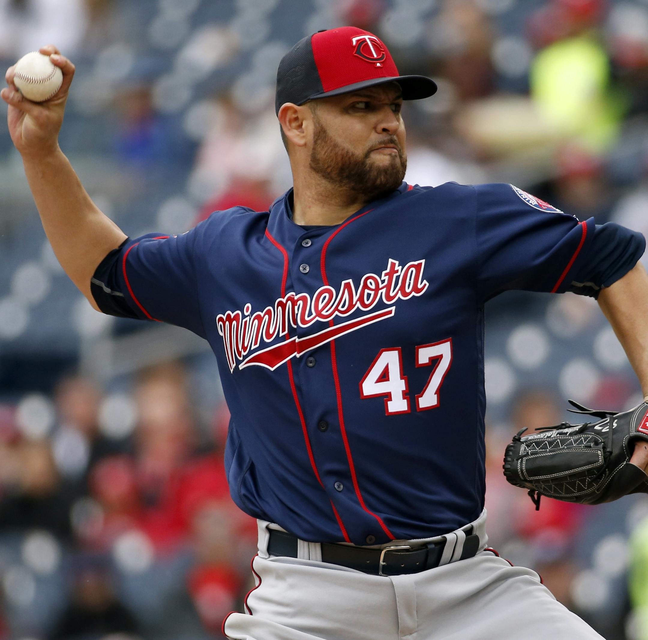 Minnesota Twins starting pitcher Ricky Nolasco throws during the third inning of an exhibition baseball game against the Washington Nationals, at Nationals Park, Saturday, April 2, 2016, in Washington. (AP Photo/Alex Brandon)