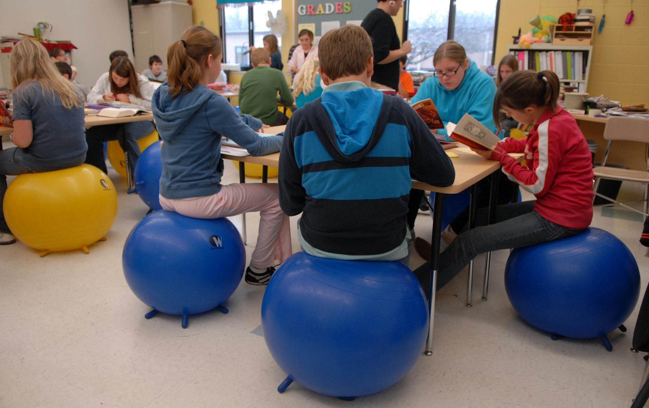 BALANCE: The kids in Melisa Tennant�s seventh grade English class at Sunrise Park Middle School in White Bear Lake are giving new meaning to being �on the ball.� All 140 kids she teaches in five classes now use the balance balls instead of traditional desks. While it�s not the first time for balance balls in classrooms � educators and therapists have suggested them previously for younger children who exhibit forms of attention deficit � it is a new application to somewhat older students in middl