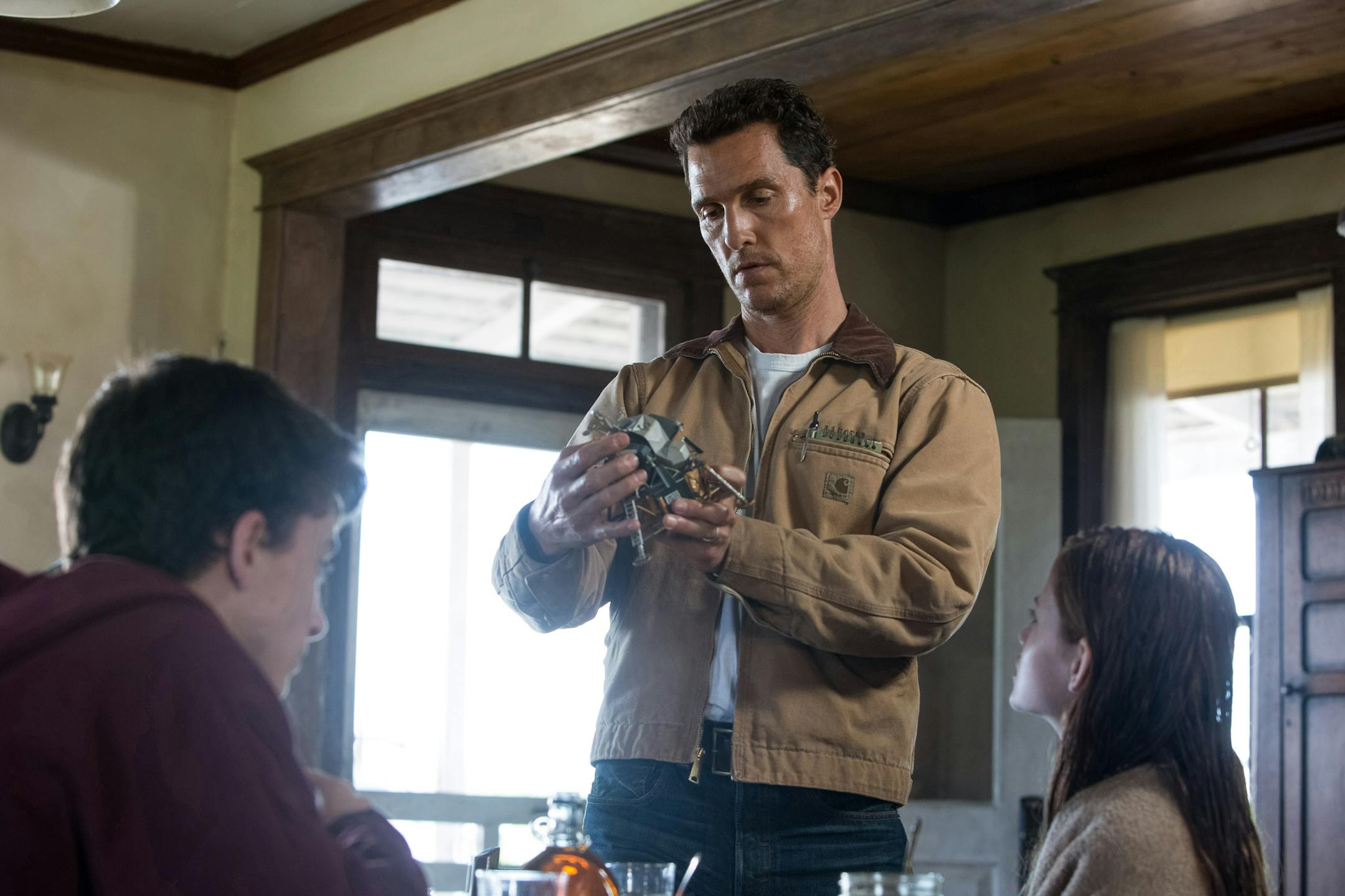 Left to right: Timoth√©e Chalamet, Matthew McConaughey and Mackenzie Foy in INTERSTELLAR; from Paramount Pictures and Warner Brothers Entertainment.