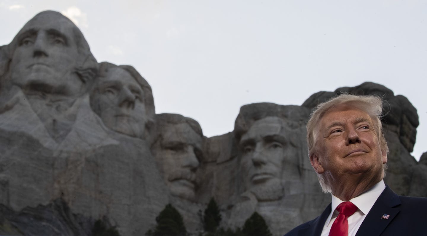 President Donald Trump smiles at Mount Rushmore National Memorial, Friday, July 3, 2020, near Keystone, S.D. (AP Photo/Alex Brandon)