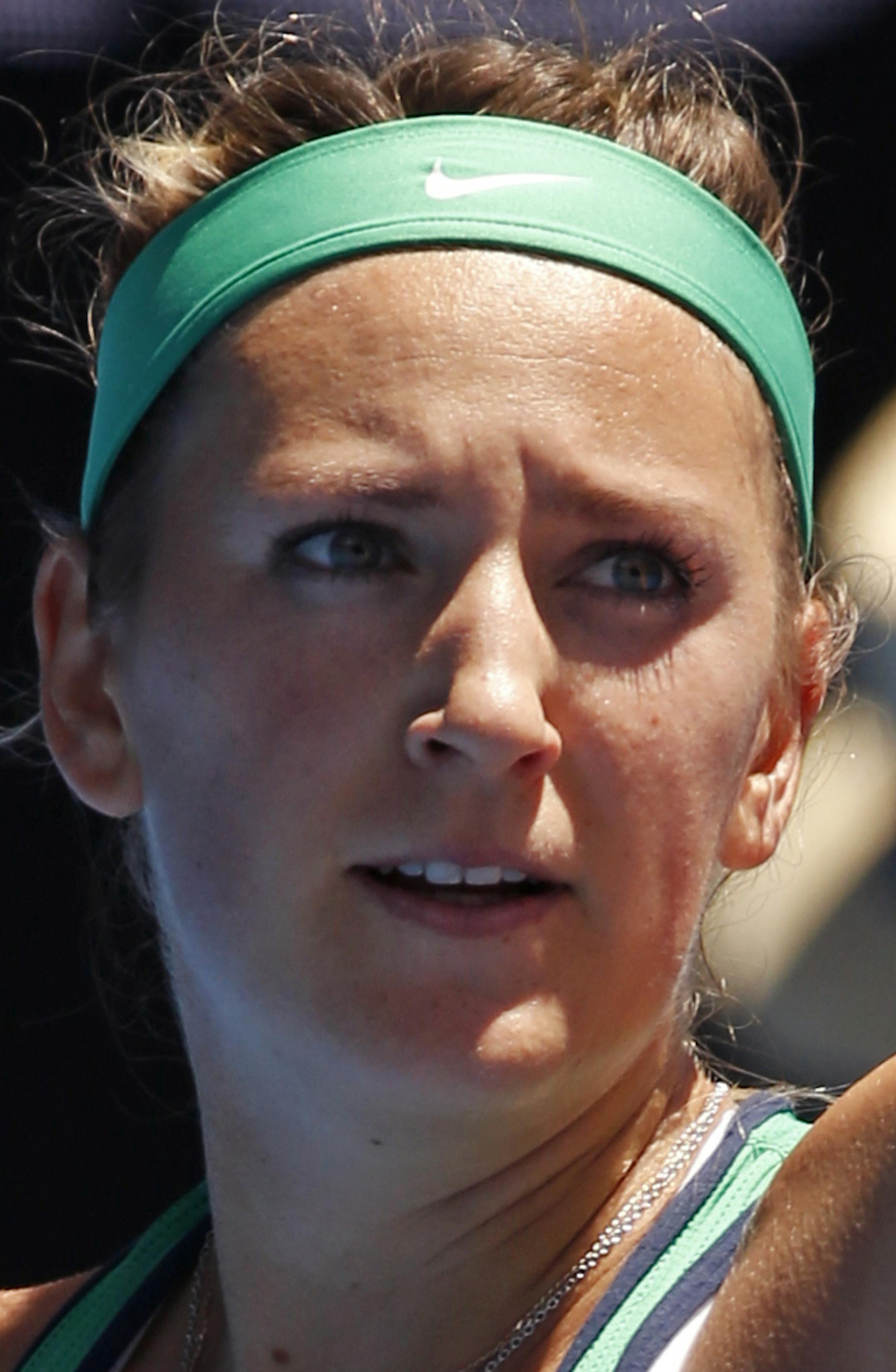Victoria Azarenka of Belarus celebrates after defeating Naomi Osaka of Japan during their third round match at the Australian Open tennis championships in Melbourne, Australia, Saturday, Jan. 23, 2016.(AP Photo/Vincent Thian)